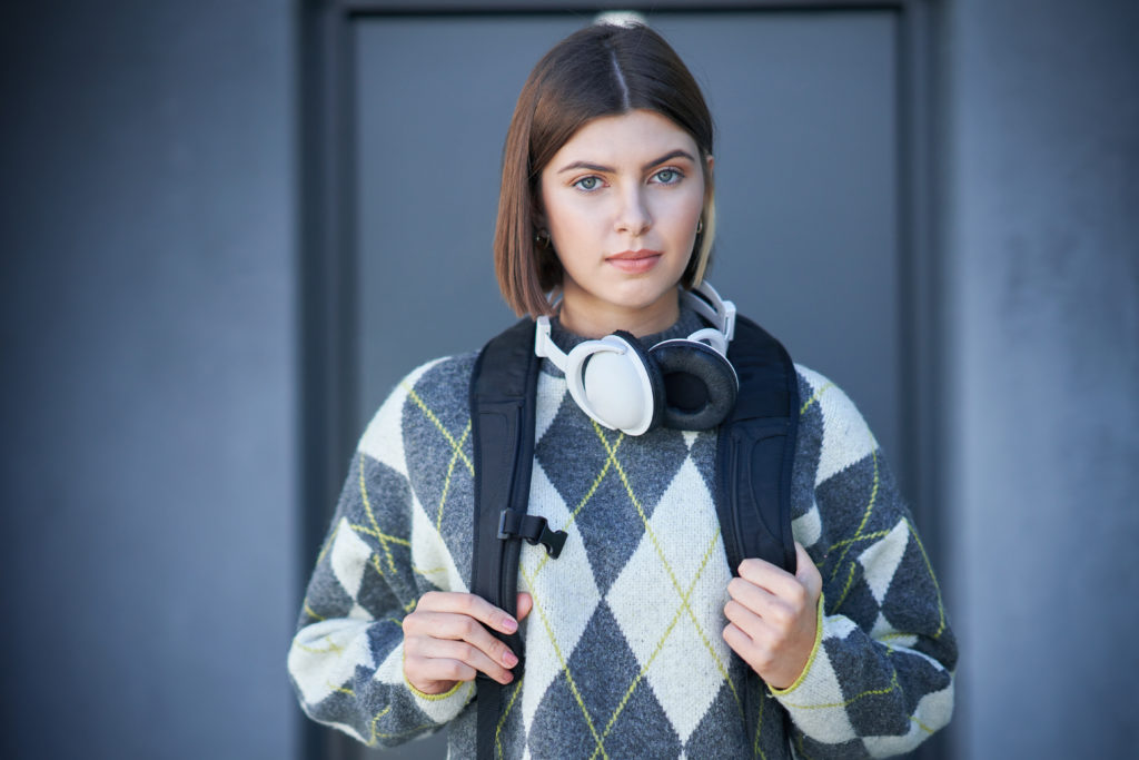 Teenage girl in an argyle sweater